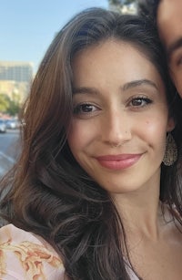 a man and woman posing for a selfie