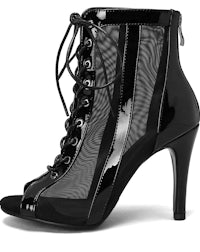 a women's black high heeled boot with mesh detailing